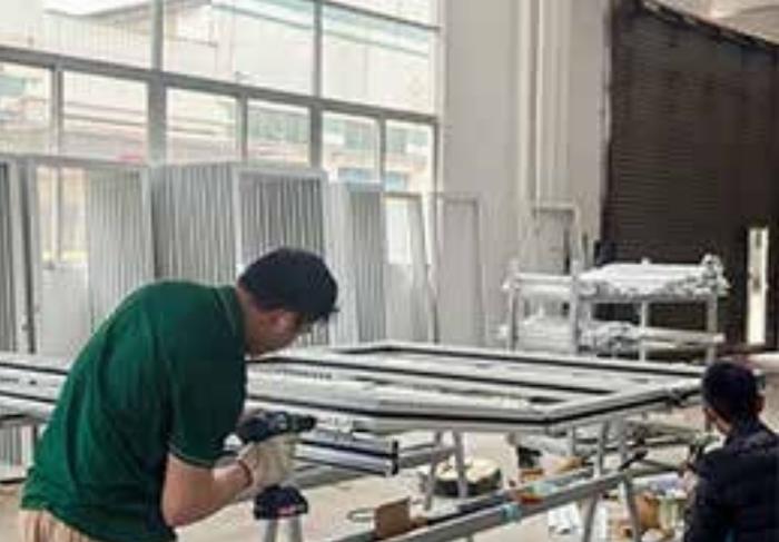 Technician assembling a window frame