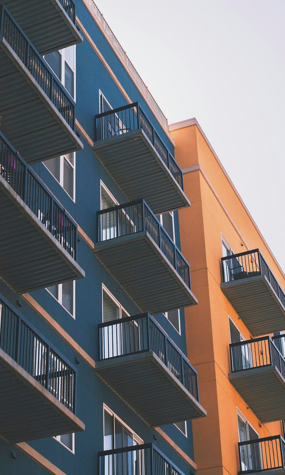 Apartment block with balconies and aluminium windows